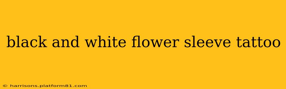 black and white flower sleeve tattoo
