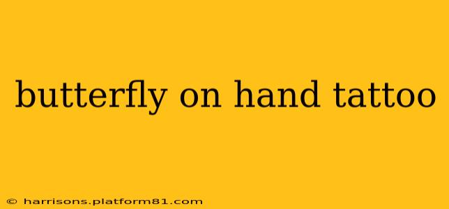 butterfly on hand tattoo