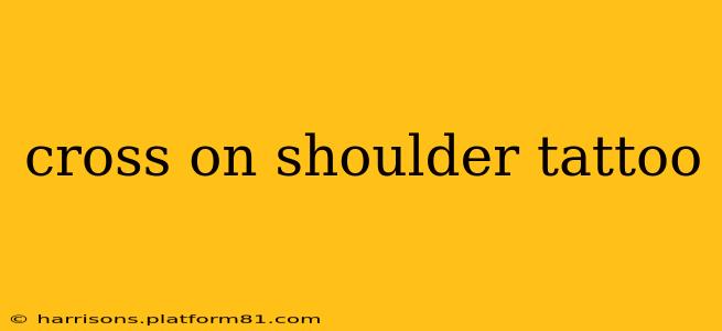 cross on shoulder tattoo