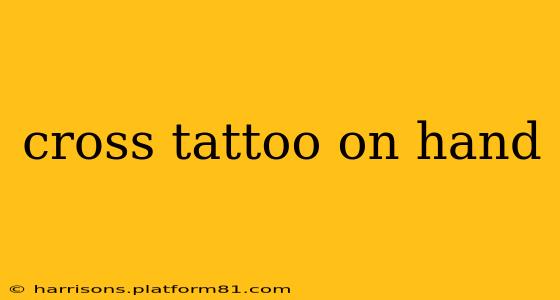 cross tattoo on hand