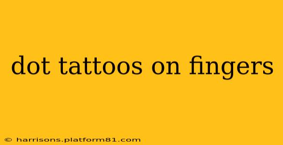 dot tattoos on fingers
