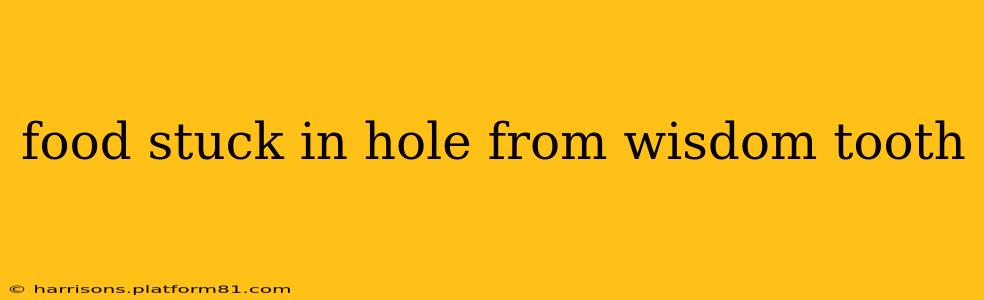 food stuck in hole from wisdom tooth