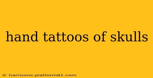 hand tattoos of skulls