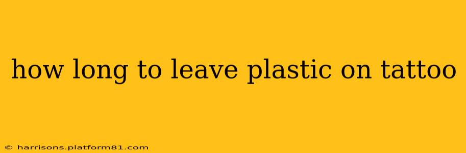 how long to leave plastic on tattoo