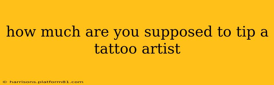 how much are you supposed to tip a tattoo artist