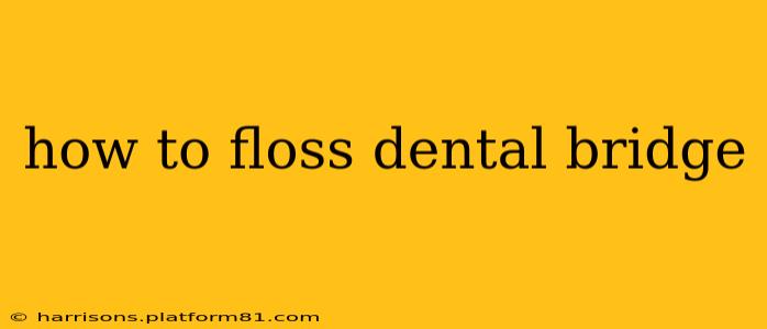 how to floss dental bridge