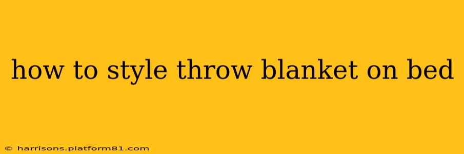 how to style throw blanket on bed