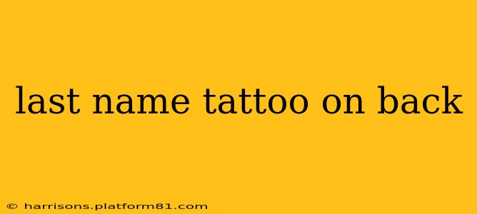 last name tattoo on back