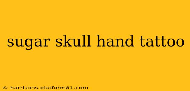 sugar skull hand tattoo