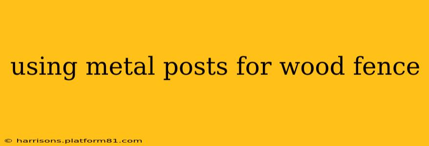 using metal posts for wood fence