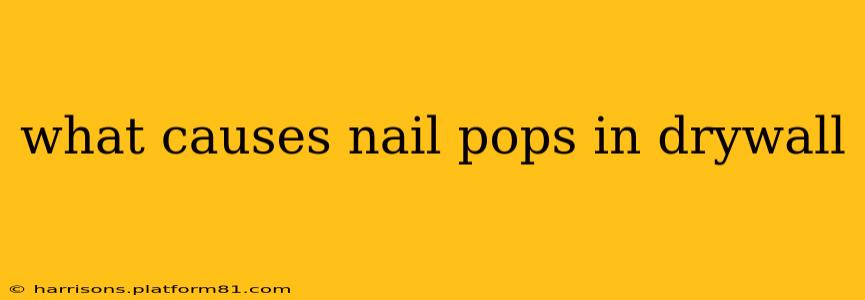 what causes nail pops in drywall