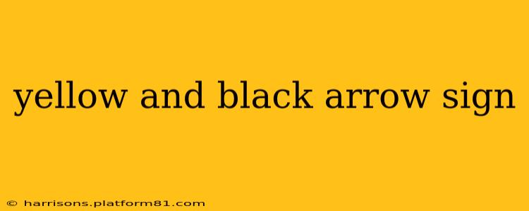 yellow and black arrow sign